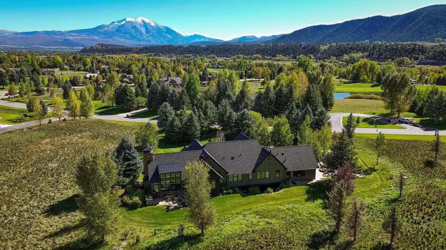 Aerial view of a mountain home in the Aspen valley