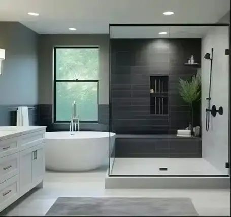Remodeled bathroom with freestanding tub and glass shower