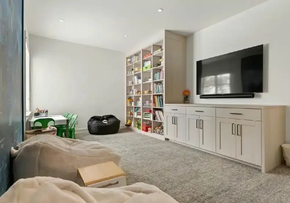 Family room with built-in shelving and media wall
