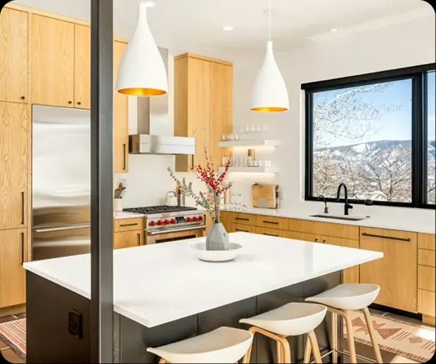Light oak kitchen with island seating and mountain window
